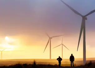Wind turbines at sunset